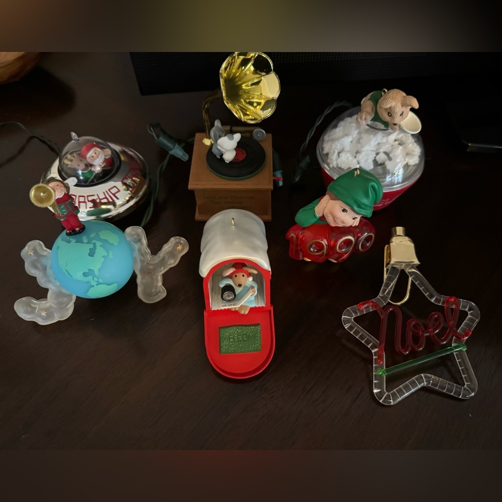 7 light-up and mechanical ornaments from Hallmark. 1990s. No boxes.